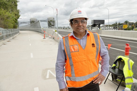 Transport for NSW project manager  Tarnjit Chahal next to the new overpass.