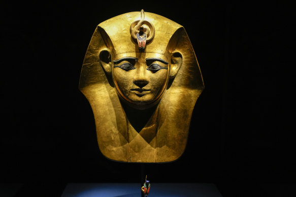 A gold mask of King Amenemope is part of Ramses and the Gold of the Pharaohs at the Australian Museum.