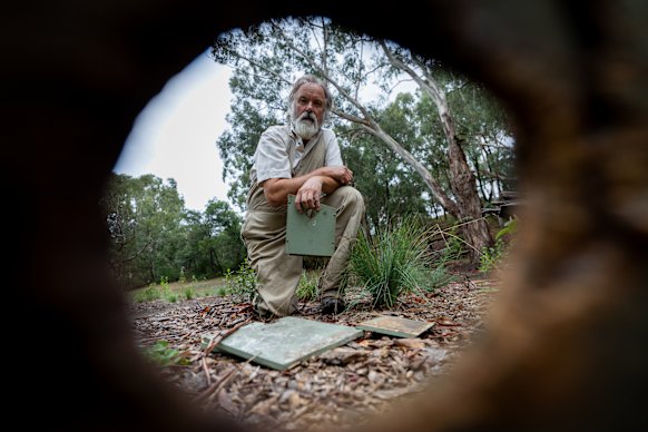 Peter Wiltshire with a vandalised nest box. The boxes are used to temporarily recreate tree hollow habitat when the surrounding trees aren’t mature enough to have hollows.