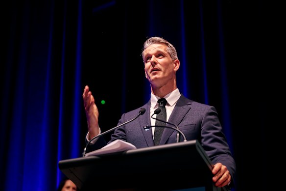 Andrew Charlton MP accepts the award for Emerging Political Leader of the Year at the 2026 McKinnon Prize event.