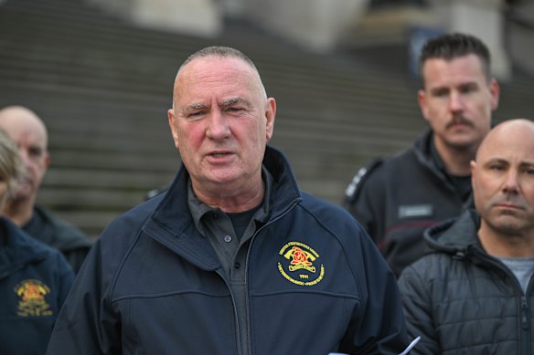 United Firefighters Union secretary Peter Marshall speaking outside Parliament House in June 2025.