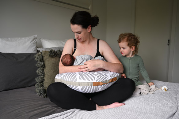 Tess Farry, with baby Olive and daughter Frankie, says it is important for mothers to be able to show themselves breastfeeding, so it is not viewed as something that must be hidden.