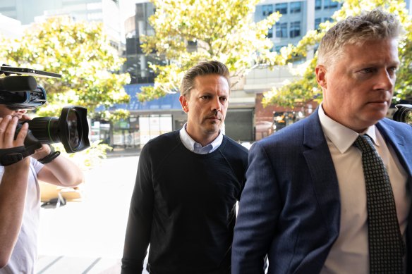 Brett Henson and lawyer Paul McGirr outside Downing Centre Local Court on Wednesday.