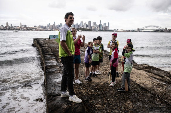 Pat Cummins and Alyssa Healy promoting Play Cricket Week with young children.