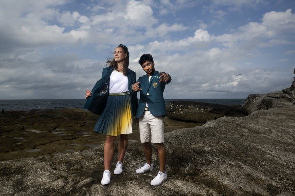 Water Polo player Tilly Kearns and breakdancer Jeff Dunne in the official formal uniforms for the Paris Games. 
