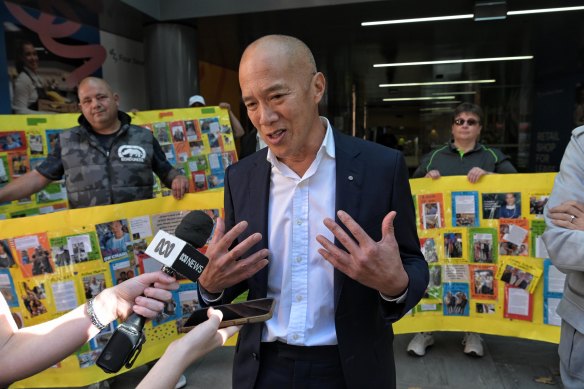 Charlie Teo is greeted by supporters as he leaves the last day of a disciplinary inquiry in March.