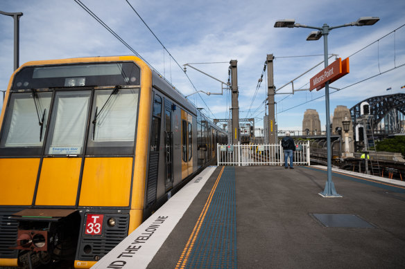 A Tangara train pulls out of Milsons Point station on a journey across Sydney Harbour Bridge on Tuesday.