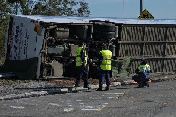 Police at the scene of the fatal Hunter Valley bus crash on Monday.