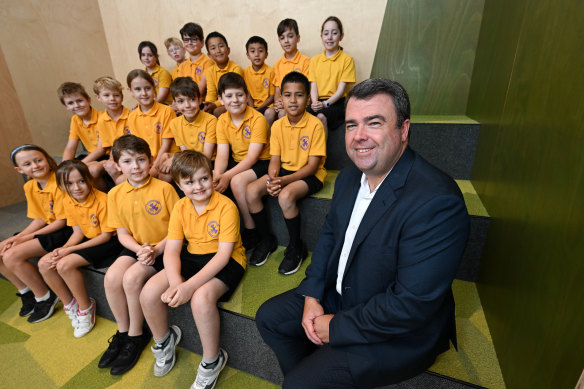 Ruskin Park Primary School principal Andrew Moore, pictured with grade 3 students, says the school’s focus on attitude and effort, rather than getting the right answer, has helped its NAPLAN results. 