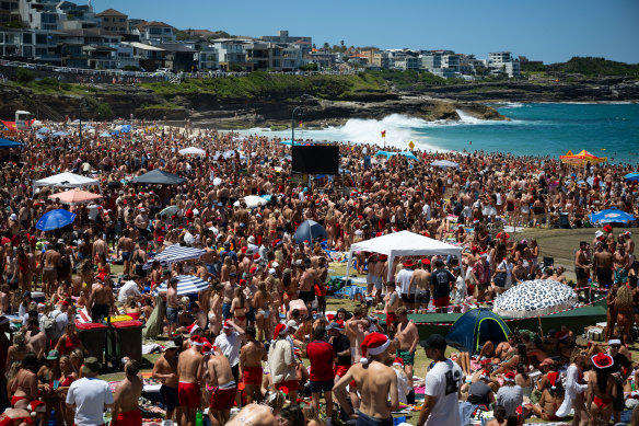 Hundreds of backpackers flocked to Sydney’s Bronte Beach on Christmas Day.