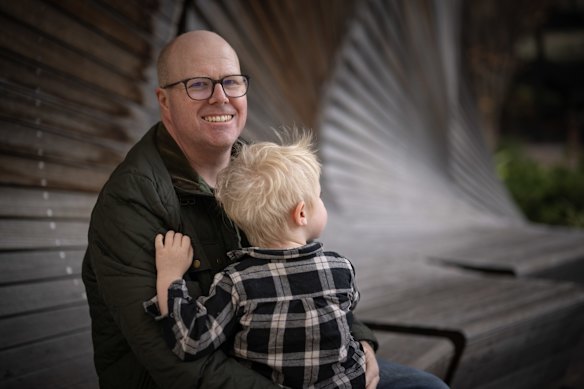 Nathan Barker with son Edward.