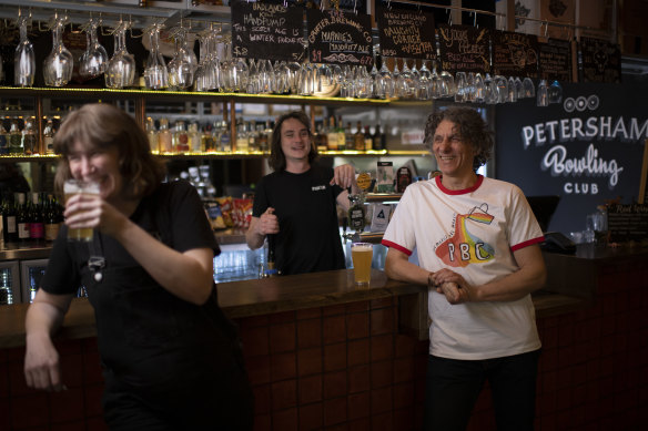 I’ll drink to that: Petersham Bowling Club general manager Penny Ryan, bar manager Carl Manwarring and president George Catsi.