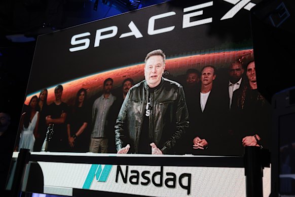Elon Musk before the ringing of the Nasdaq opening bell on SpaceX’s trading debut on Friday.