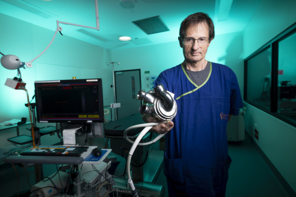 Professor David Kaye, director of cardiology at The Alfred, holds the newly arrived Bivacor total artificial heart.