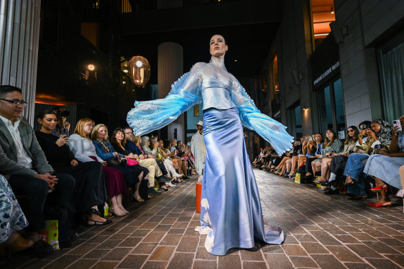 A model walks the runway at the launch of Melbourne Fashion Week on Monday. 