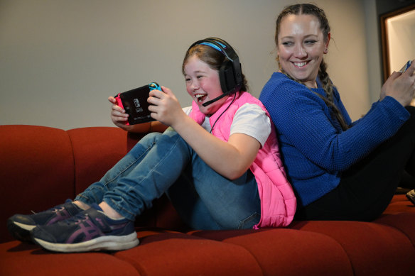 Ange and Stella Hanson share the fun of gaming before the main event at Fed Square in the coming week.