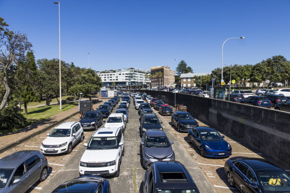 Long lines at St Vincent’s drive-through COVID testing clinic at Bondi Beach.