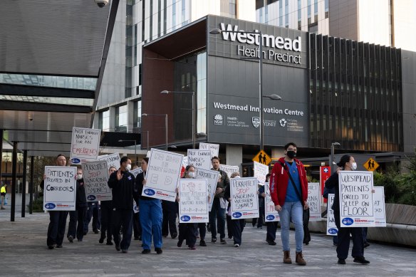Westmead Hospital Nurses conduct a protest walkout on Monday at the end of their night shift.