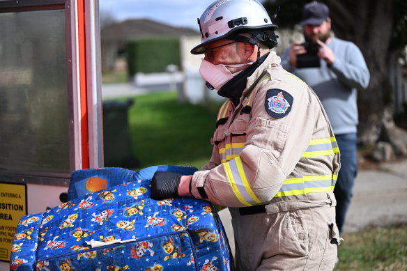 Arson and explosives squad detectives investigate the deadly fire in Sydenham.