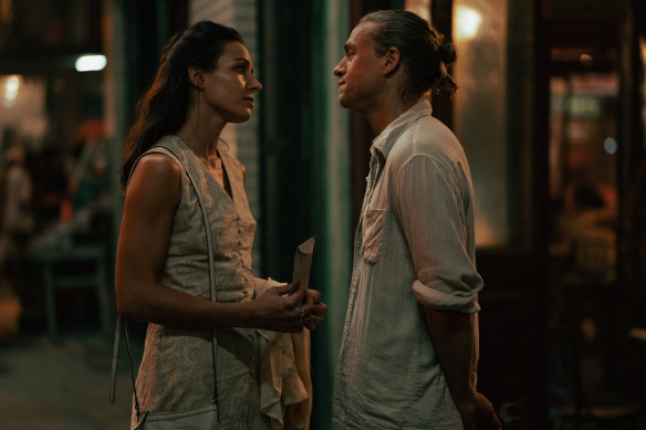Hunnam’s Lin finds the prospect of love in his relationship with the mysterious Karla (Antonia Desplat), left.