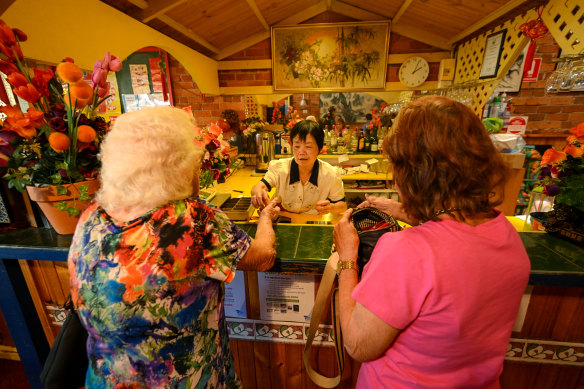 Connie serving customers. 