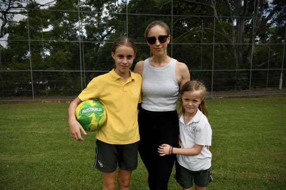 Kim Hardwick plays soccer with her two girls, Elliot, 11 and Marlowe, 7.