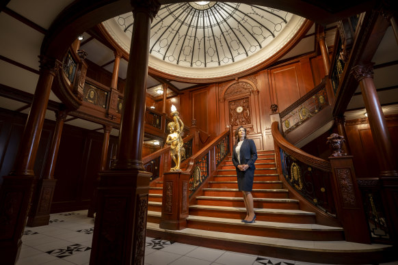 Jessica Sanders, chief executive of the RMS Titanic, with the replica of the Grand Staircase at the Titanic which is on display at the Melbourne Museum from Monday. 