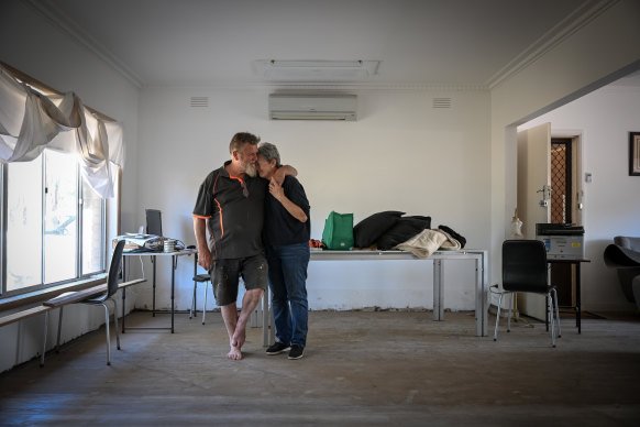 Bruce and Eileen Kilpatrick in their flood-affected home on Cromwell Street.