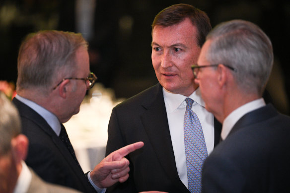 Prime Minister Anthony Albanese speaks with the Business Council of Australia’s chief executive Bran Black (centre) and president Geoff Culbert (right).