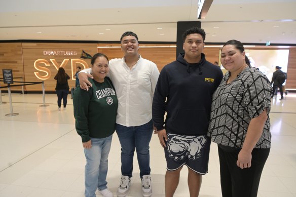Renee Tuafale with her son Jobe Tuafele and Daetyn Dean with his mother Maria Barrett at Sydney airport in 2023.