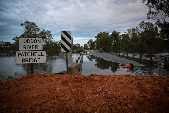 The floodwater level rose to the top of the Patchell Bridge in Kerang on Saturday morning.