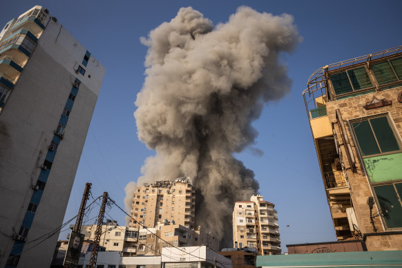 Smoke rises after an Israeli airstrike in Tyre, Lebanon on Friday.