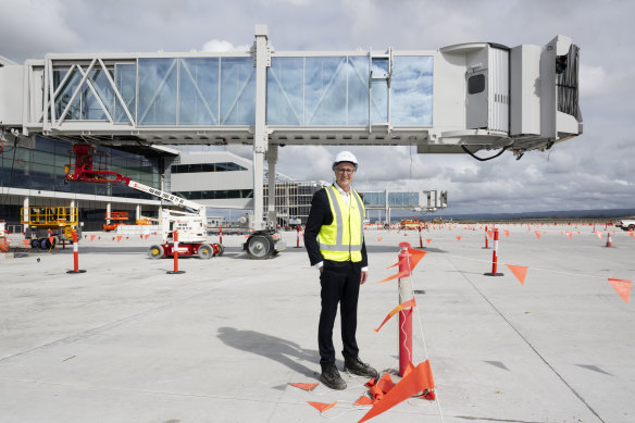 Western Sydney Airport chief executive Simon Hickey in front of one of the new aerobridges.