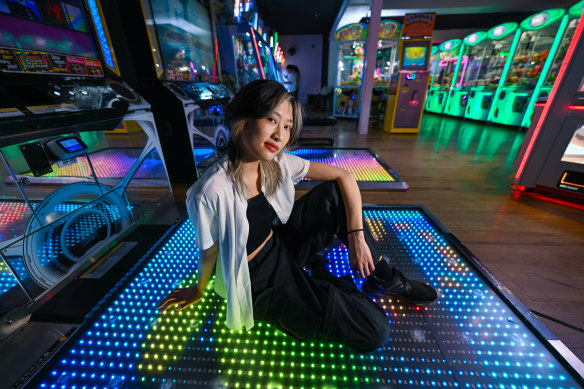 Arcade dance game player, 24-year-old Kazie Lim. 