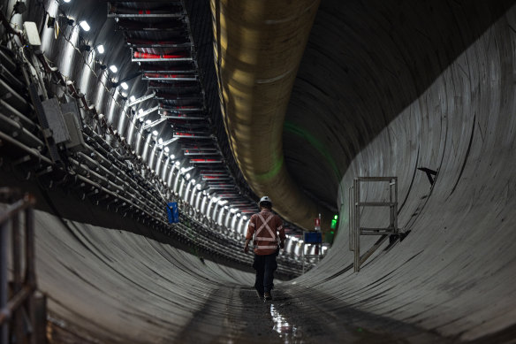 A worker walks through one of the twin tunnels under Rosehill Racecourse near Parramatta on Monday.
