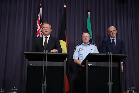 ASIO director-general Mike Burgess (right) said the national terror threat level remains probable.