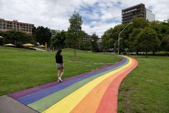 A pedestrian on the rainbow path at Prince Alfred Park on Monday.