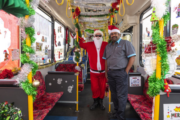 Dave Wells and Arin Thermampilly on their winning bus.