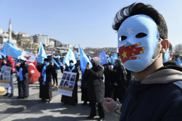 A member of the Uighur community living in Turkey joins a protest against China in Istanbul last month.