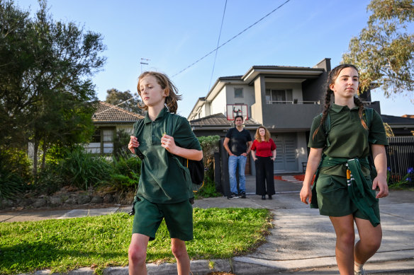 Caroline Baird and Joseph Gallo with their children Jack and Hannah. The family is zoned to their third-closest school.