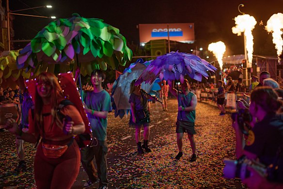 Participants march during the Mardi Gras parade.
