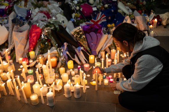 Candles are lit to honour Aiden Becker at Mernda vigil on Friday night.