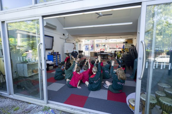 A masked-up music lesson at Canterbury Primary in Melbourne.