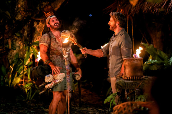 Simon has his torch snuffed in Australian Survivotr by Jonathan LaPaglia. 