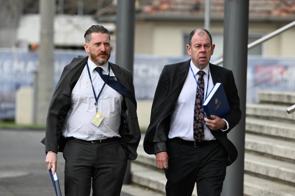 Detective Senior Constable Gareth Shepherdson (left) and Detective Inspector David Dunstan at the Ballarat Magistrates’ Court on Thursday.