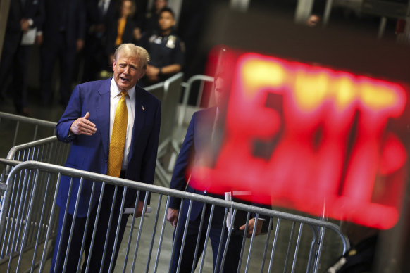 Different tie: Republican presidential candidate, former President Donald Trump speaks to the media after the day’s court proceedings in New York.