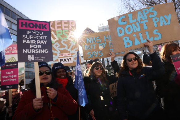 Healthcare workers take further strike action for fair pay in Westminster in London on Monday. They will walk out again on Tuesday and workers from other sectors will join them later in the week.