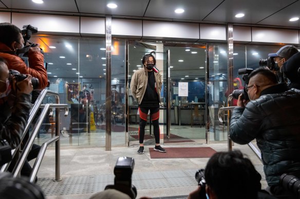 Mike Lam King-nam, who participated in the Hong Kong pro-democracy primary elections, leaves the Ma On Shan police station after being granted bail.