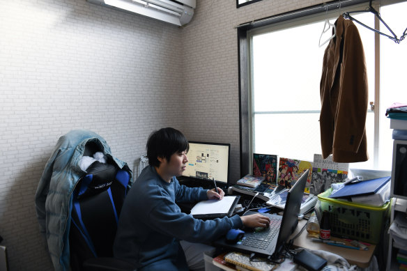 Tetsuya Akutsu, a freelance animator, at work in his apartment in Tokyo.