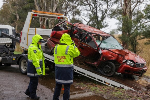 Police at the scene of a car crash where four teenagers were killed in Bochara.